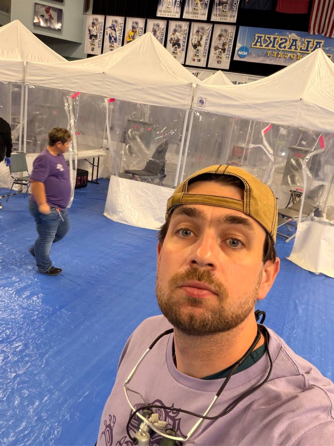 Dr. Volodymyr Kachmar at the temporary RAM clinic site in the Alaska arena.
